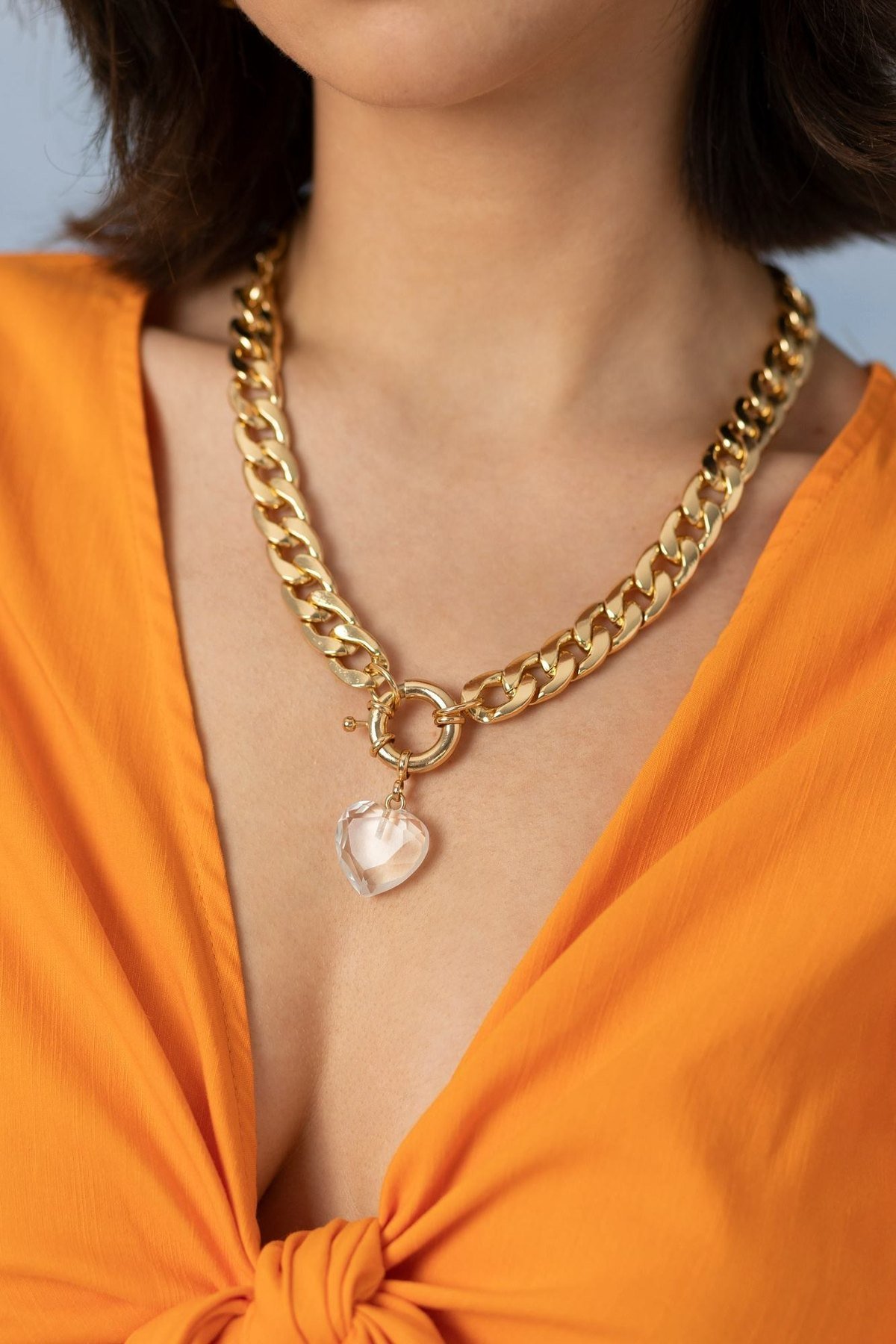 Gold chain necklace with heart pendant