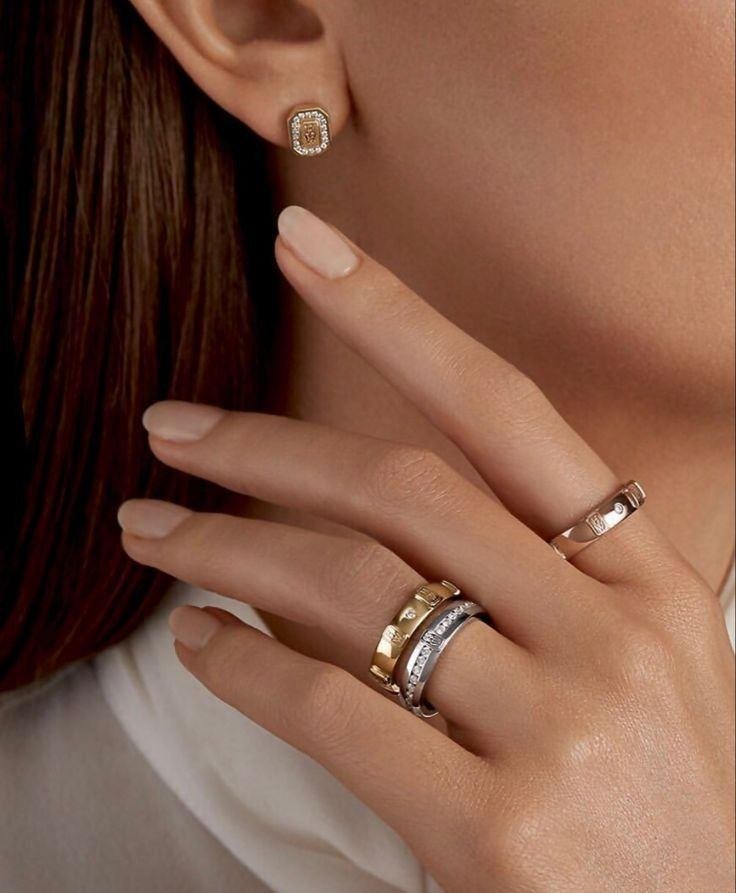 Layered earrings and rings